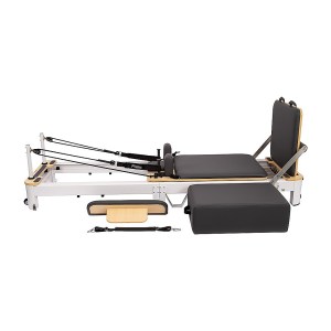 Pilates reformer equipment with black and wooden finish