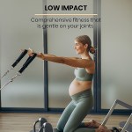 Pregnant woman doing low impact exercise with straps.