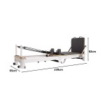 Pilates reformer with dimensions and measurements shown.