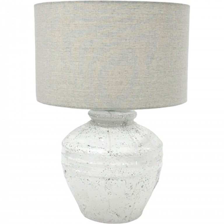 Ceramic table lamp with grey fabric shade.