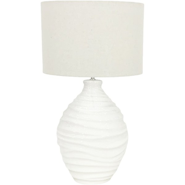 White table lamp with textured base and shade.