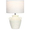 Ceramic table lamp with white fabric shade.