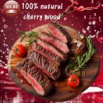 asmoke 100% natural cherry wood bbq smoker pellets (9kg / 20lbs) Sliced steak with rosemary and tomatoes on wood.