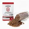 Natural cherry wood pellets spilling from bag.