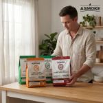 asmoke 4 piece premium wood pellet variety pack oak, cherry & 2x apple (4 x 2.27kg bags) Man displaying Asmoke natural wood pellets in kitchen.