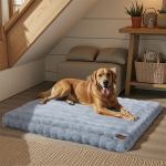 plush pet bed with non slip base and removable cover Dog relaxing on comfy blue pet bed indoors.