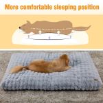 plush pet bed with non slip base and removable cover Dog sleeping on comfy grey bed for better posture.