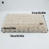 plush pet bed with non slip base and removable cover Fluffy beige pet bed with dimensions, size M.