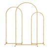 Golden metal backdrop frame with arches.