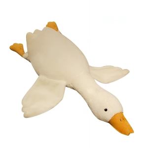White plush duck toy with orange beak