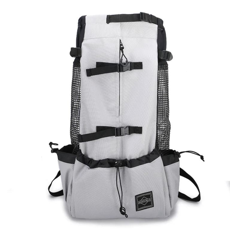 Light grey hiking backpack with black straps