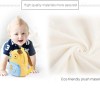 Baby with yellow dog backpack, plush material detail