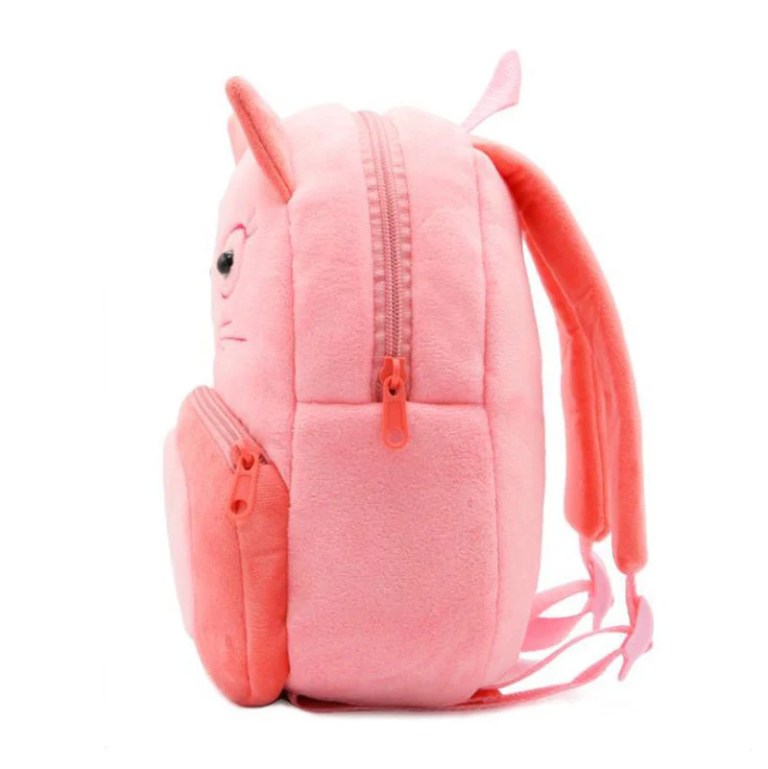 Pink plush unicorn backpack side view