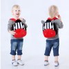 image 1 Toddler wearing zebra backpack, front and back views