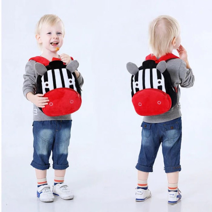 image 1 Toddler wearing zebra backpack, front and back views