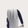 Grey plush children’s backpack with blue straps