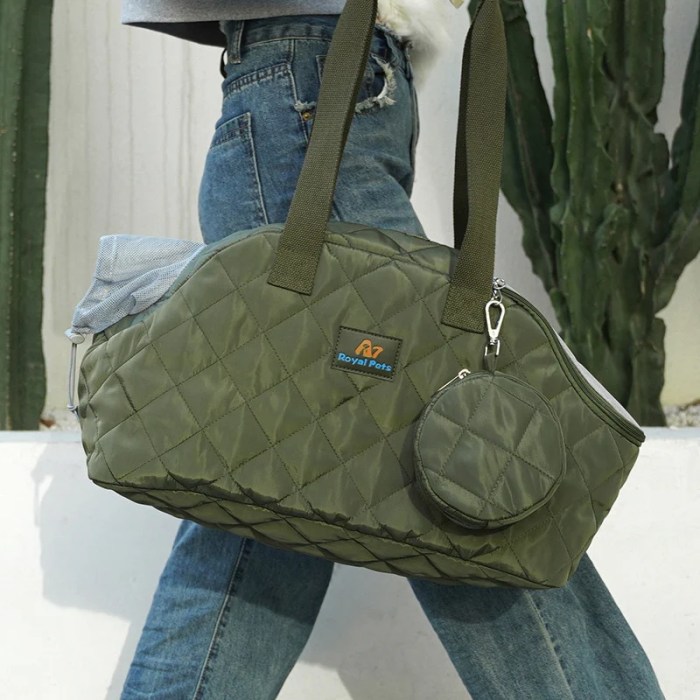 Green quilted duffel bag with shoulder strap