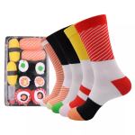 Colourful sushi-themed novelty socks beside sushi set