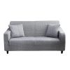 Grey fabric two-seater sofa with cushions