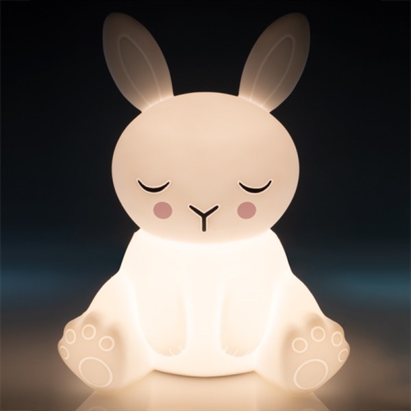 Glowing bunny night light with closed eyes