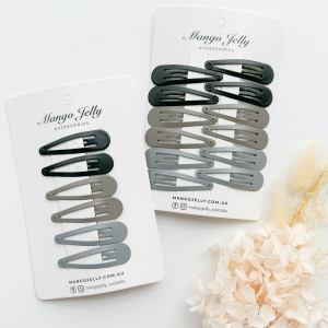 Neutral snap hair clips on display cards