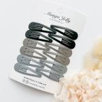 Neutral snap hair clips on display card
