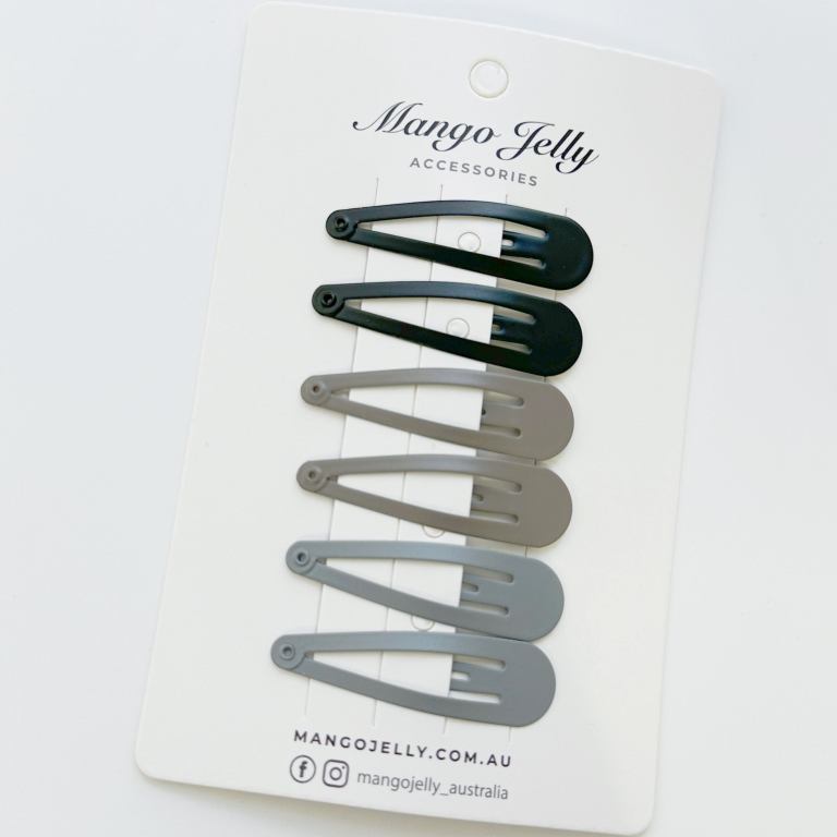 Assorted snap hair clips on display card