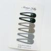 Neutral snap hair clips on display card