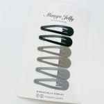 Neutral snap hair clips on display card