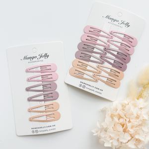 Pastel snap hair clips on display cards