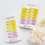 v659 basic lemon 6p 202511101920 00.jpg Yellow and pink snap hair clips on display cards