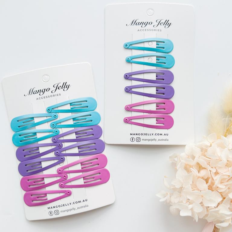Pastel snap hair clips on display cards