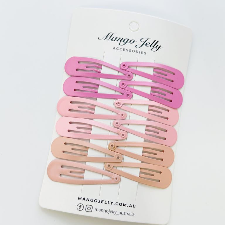 essential snap hair clips pink 6 pieces Pastel pink snap hair clips on display card