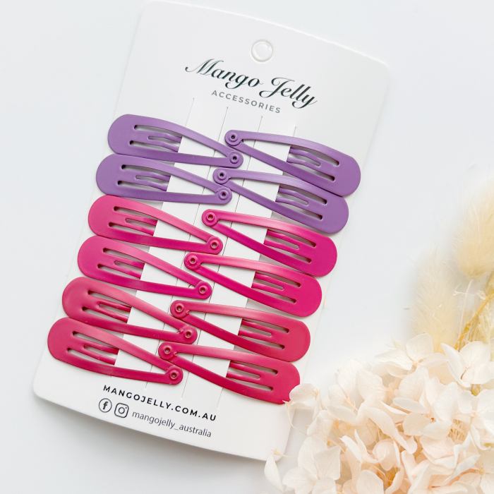 essential snap hair clips rosie 6 pieces Pink and purple snap hair clips on display card