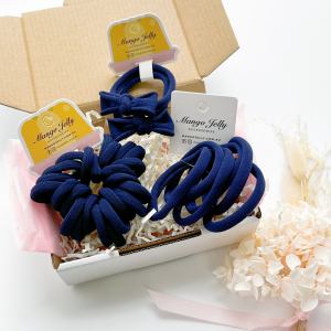 Navy blue hair ties in gift box