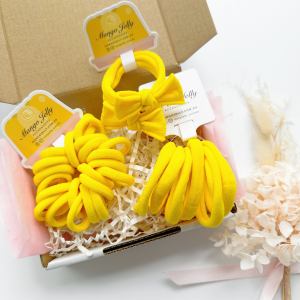 Bright yellow hair ties and bow headband set