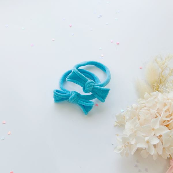 handmade simple bow metal free hair ties sky 1 pairs bright pink Teal bow hair ties on white background