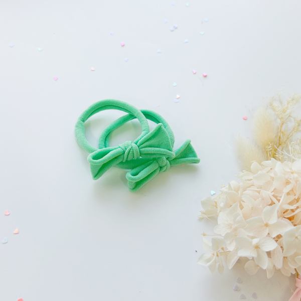 handmade simple bow metal free hair ties sky 1 pairs bright pink Green bow hair ties on white background