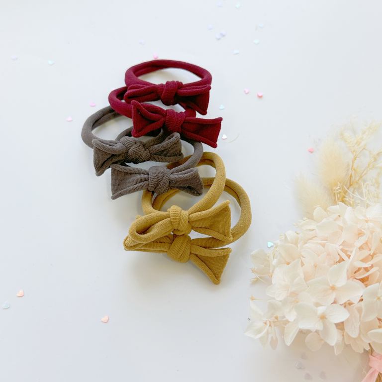 handmade simple bow metal free hair ties mustard 1 pairs grey Fabric bow headbands on white background