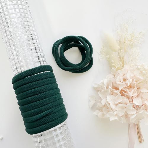 v659 metalfree 4cm 10p sk bottlegreen 1 m 160715 00.jpg Dark green hair ties on silver holder