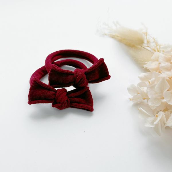 handmade simple bows school colours maroon 1 pairs Red bow headbands on white surface
