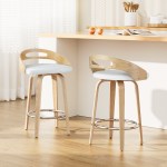 Two wooden bar stools at kitchen island