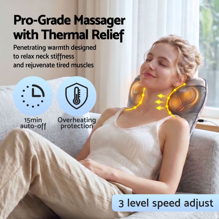 Woman using heated neck massager on couch