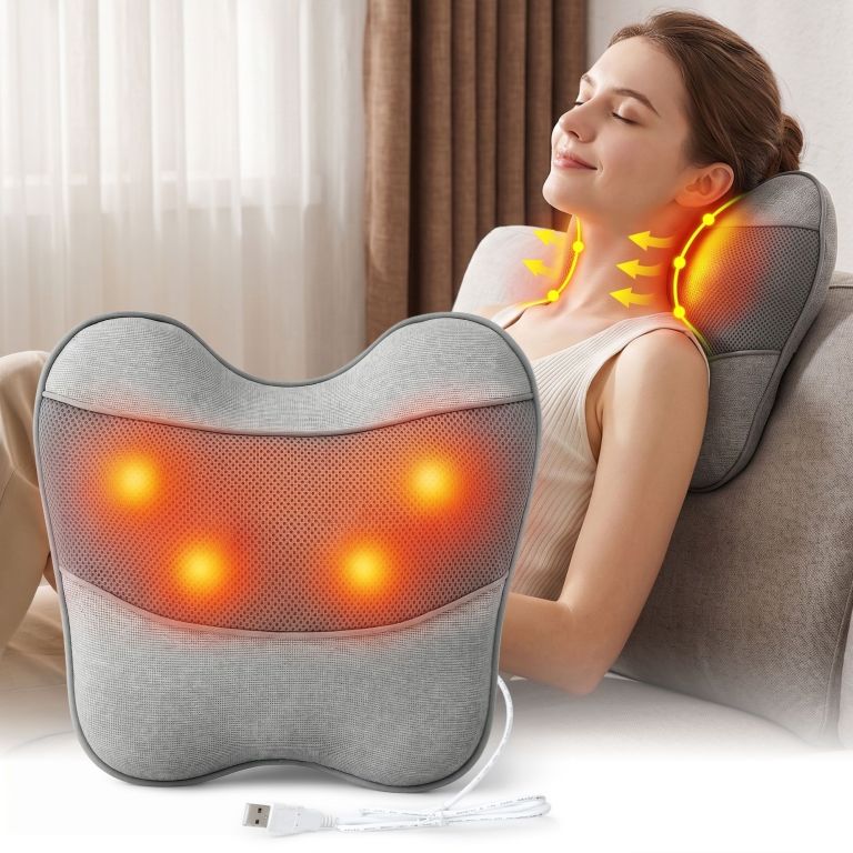 Woman using heated neck and back massager