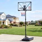 everfit portable basketball hoop system adjustable full foldable stand 2.07m Portable basketball hoop on suburban driveway