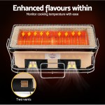 Rectangular charcoal grill with glowing coals and vents
