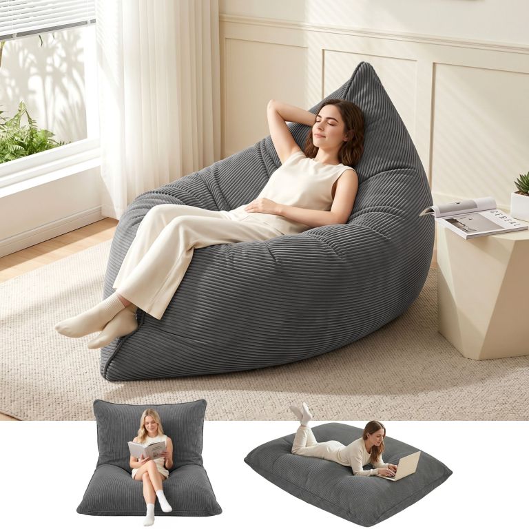 Woman relaxing on grey corduroy bean bag