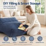 Woman filling large floor cushion with foam pieces