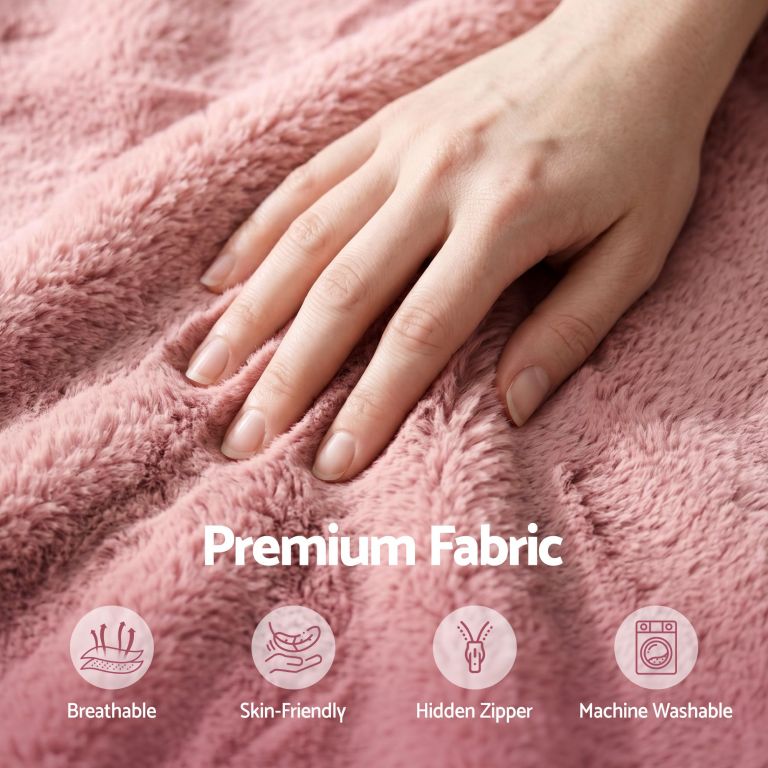 Hand touching soft pink plush fabric