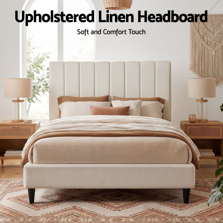 Upholstered linen headboard in modern neutral bedroom